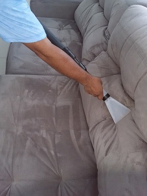 Cleaning furniture in a Bournemouth home Furniture cleaning in a Bournemouth home
